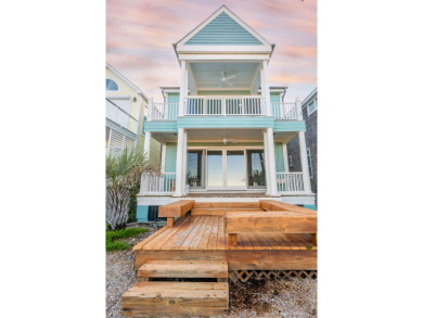 It's not often that an oceanfront home overlooking the 18th hole on Wild Dunes Harbor Golf Resort in South Carolina - for sale on GolfHomes.com, golf home, golf lot