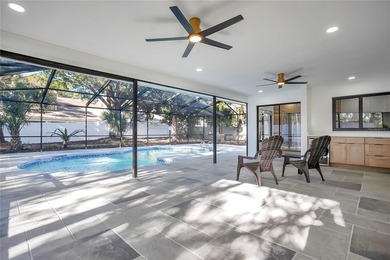 Prepare to be impressed by this fully remodeled Clearwater gem on Countryside Country Club in Florida - for sale on GolfHomes.com, golf home, golf lot