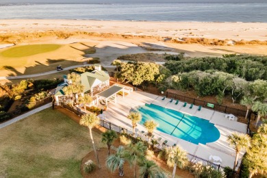 It's not often that an oceanfront home overlooking the 18th hole on Wild Dunes Harbor Golf Resort in South Carolina - for sale on GolfHomes.com, golf home, golf lot
