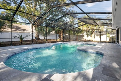 Prepare to be impressed by this fully remodeled Clearwater gem on Countryside Country Club in Florida - for sale on GolfHomes.com, golf home, golf lot