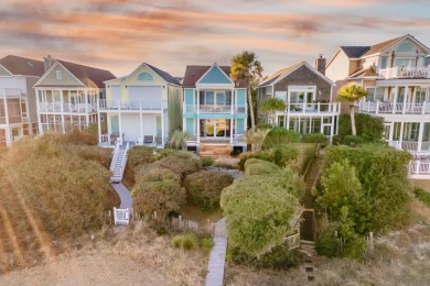 It's not often that an oceanfront home overlooking the 18th hole on Wild Dunes Harbor Golf Resort in South Carolina - for sale on GolfHomes.com, golf home, golf lot