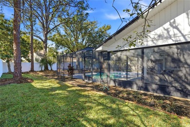 Prepare to be impressed by this fully remodeled Clearwater gem on Countryside Country Club in Florida - for sale on GolfHomes.com, golf home, golf lot