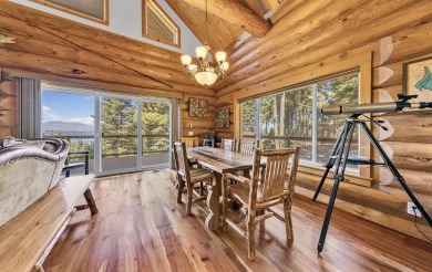 One of a kind, hand, crafted log home with extraordinary views on Lake Almanor Country Club in California - for sale on GolfHomes.com, golf home, golf lot