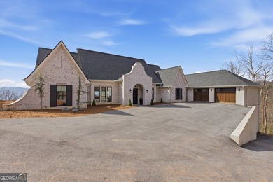 Luxurious Spanish/Mediterranean Custom Estate perched on 5.19 on Sky Valley Resort and Country Club in Georgia - for sale on GolfHomes.com, golf home, golf lot