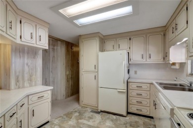 Lots of space in this 2 bedroom/2 full bath 1979 manufactured on Maple Leaf Golf and Country Club in Florida - for sale on GolfHomes.com, golf home, golf lot