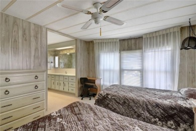 Lots of space in this 2 bedroom/2 full bath 1979 manufactured on Maple Leaf Golf and Country Club in Florida - for sale on GolfHomes.com, golf home, golf lot