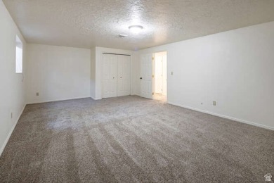 This home is move in ready with BRAND NEW carpet, paint on Bloomington Country Club in Utah - for sale on GolfHomes.com, golf home, golf lot