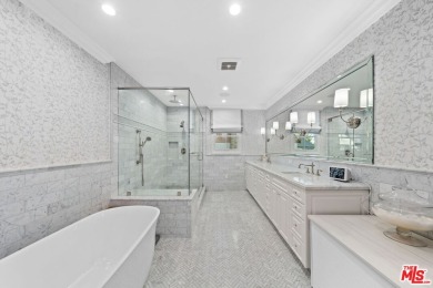 Immerse yourself in the epitome of refined living with this on Wilshire Country Club in California - for sale on GolfHomes.com, golf home, golf lot