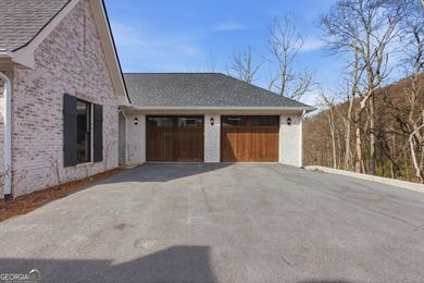 Luxurious Spanish/Mediterranean Custom Estate perched on 5.19 on Sky Valley Resort and Country Club in Georgia - for sale on GolfHomes.com, golf home, golf lot