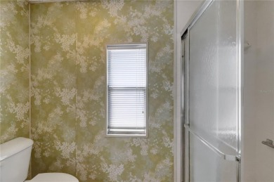 Lots of space in this 2 bedroom/2 full bath 1979 manufactured on Maple Leaf Golf and Country Club in Florida - for sale on GolfHomes.com, golf home, golf lot