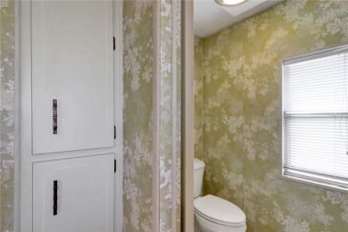 Lots of space in this 2 bedroom/2 full bath 1979 manufactured on Maple Leaf Golf and Country Club in Florida - for sale on GolfHomes.com, golf home, golf lot