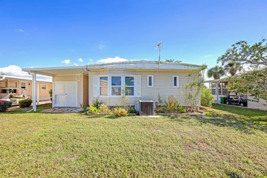 Lots of space in this 2 bedroom/2 full bath 1979 manufactured on Maple Leaf Golf and Country Club in Florida - for sale on GolfHomes.com, golf home, golf lot