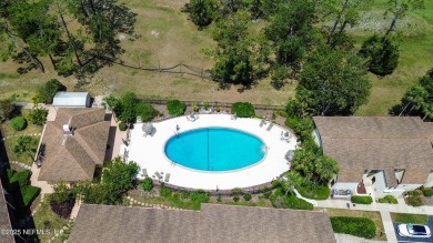 Welcome to effortless Florida living in this ground-floor end on St. Augustine Shores Golf Club in Florida - for sale on GolfHomes.com, golf home, golf lot