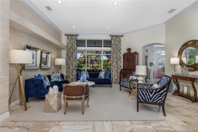 AMAZING show stopper 3B/3.5ba/2car gar., DEN & golf cart bay on Monarch Country Club in Florida - for sale on GolfHomes.com, golf home, golf lot