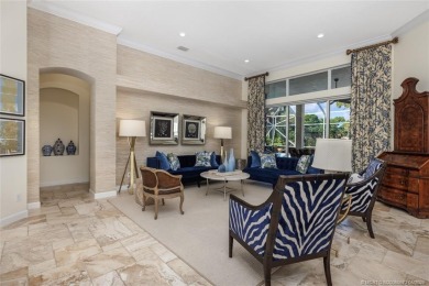 AMAZING show stopper 3B/3.5ba/2car gar., DEN & golf cart bay on Monarch Country Club in Florida - for sale on GolfHomes.com, golf home, golf lot