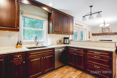 Experience the perfect blend of comfort and style in this on Lake Monterey Golf Club in Michigan - for sale on GolfHomes.com, golf home, golf lot