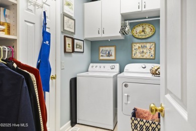 This charming Charleston-style home in the desirable Sea Trail on Sea Trail Golf Resort in North Carolina - for sale on GolfHomes.com, golf home, golf lot