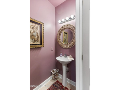 This charming Charleston-style home in the desirable Sea Trail on Sea Trail Golf Resort in North Carolina - for sale on GolfHomes.com, golf home, golf lot