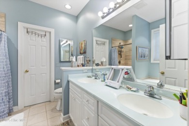 This charming Charleston-style home in the desirable Sea Trail on Sea Trail Golf Resort in North Carolina - for sale on GolfHomes.com, golf home, golf lot