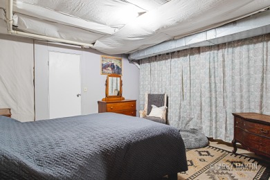 Experience the perfect blend of comfort and style in this on Lake Monterey Golf Club in Michigan - for sale on GolfHomes.com, golf home, golf lot