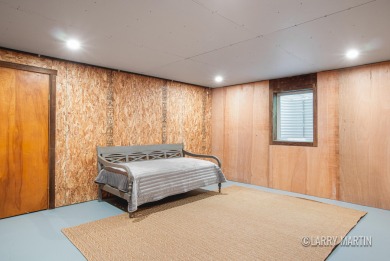 Experience the perfect blend of comfort and style in this on Lake Monterey Golf Club in Michigan - for sale on GolfHomes.com, golf home, golf lot