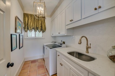Stately and beautifully remodeled 4-bedroom, 3.5-bath brick home on West Lake Country Club in Georgia - for sale on GolfHomes.com, golf home, golf lot
