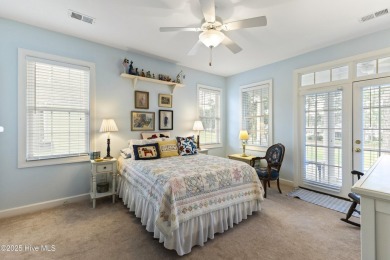 This charming Charleston-style home in the desirable Sea Trail on Sea Trail Golf Resort in North Carolina - for sale on GolfHomes.com, golf home, golf lot