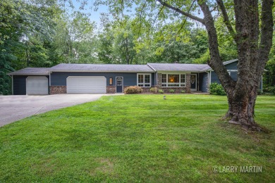 Experience the perfect blend of comfort and style in this on Lake Monterey Golf Club in Michigan - for sale on GolfHomes.com, golf home, golf lot