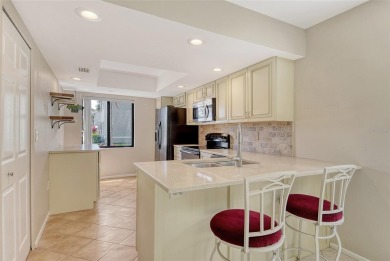 One or more photo(s) has been virtually staged. Tucked away in a on University Park Country Club in Florida - for sale on GolfHomes.com, golf home, golf lot