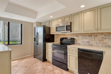 One or more photo(s) has been virtually staged. Tucked away in a on University Park Country Club in Florida - for sale on GolfHomes.com, golf home, golf lot