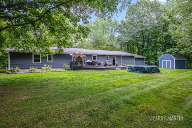 Experience the perfect blend of comfort and style in this on Lake Monterey Golf Club in Michigan - for sale on GolfHomes.com, golf home, golf lot