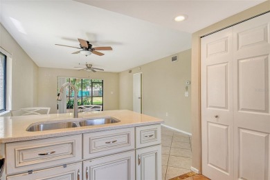 One or more photo(s) has been virtually staged. Tucked away in a on University Park Country Club in Florida - for sale on GolfHomes.com, golf home, golf lot