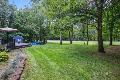 Experience the perfect blend of comfort and style in this on Lake Monterey Golf Club in Michigan - for sale on GolfHomes.com, golf home, golf lot
