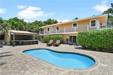 Welcome to your private tropical retreat overlooking Salt Leaf on Raptor Bay Golf Club in Florida - for sale on GolfHomes.com, golf home, golf lot