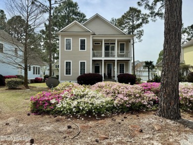 This charming Charleston-style home in the desirable Sea Trail on Sea Trail Golf Resort in North Carolina - for sale on GolfHomes.com, golf home, golf lot