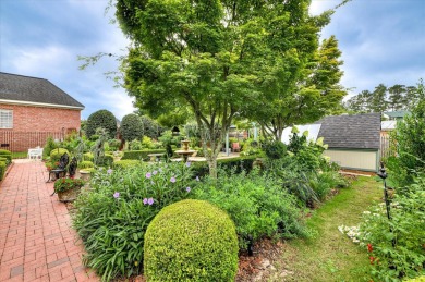 Stately and beautifully remodeled 4-bedroom, 3.5-bath brick home on West Lake Country Club in Georgia - for sale on GolfHomes.com, golf home, golf lot