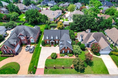Stately and beautifully remodeled 4-bedroom, 3.5-bath brick home on West Lake Country Club in Georgia - for sale on GolfHomes.com, golf home, golf lot