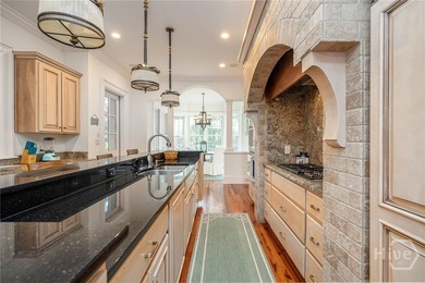 Tucked deep within the Ford Field & River Club, this estate on The Ford Field and River Club  in Georgia - for sale on GolfHomes.com, golf home, golf lot