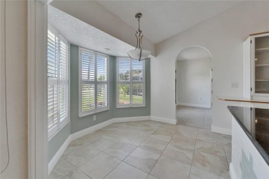 Charming Single-Family Home in Desirable Caloosa Palms II - Sun on Caloosa Greens Executive Golf Course in Florida - for sale on GolfHomes.com, golf home, golf lot