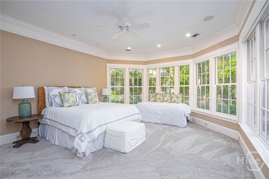 Tucked deep within the Ford Field & River Club, this estate on The Ford Field and River Club  in Georgia - for sale on GolfHomes.com, golf home, golf lot