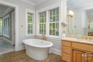 Tucked deep within the Ford Field & River Club, this estate on The Ford Field and River Club  in Georgia - for sale on GolfHomes.com, golf home, golf lot