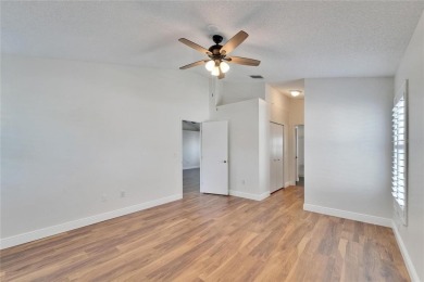 Charming Single-Family Home in Desirable Caloosa Palms II - Sun on Caloosa Greens Executive Golf Course in Florida - for sale on GolfHomes.com, golf home, golf lot