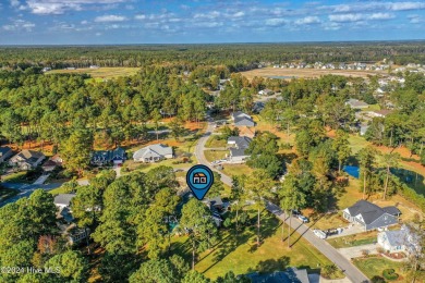 Welcome to this beautifully designed 3-bedroom, 2.5-bathroom on Brunswick Plantation and Golf Resorts in North Carolina - for sale on GolfHomes.com, golf home, golf lot