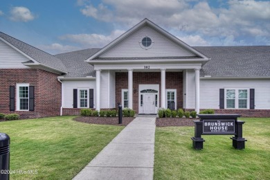 Welcome to this beautifully designed 3-bedroom, 2.5-bathroom on Brunswick Plantation and Golf Resorts in North Carolina - for sale on GolfHomes.com, golf home, golf lot