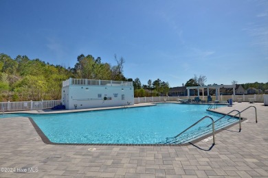 Welcome to this beautifully designed 3-bedroom, 2.5-bathroom on Brunswick Plantation and Golf Resorts in North Carolina - for sale on GolfHomes.com, golf home, golf lot