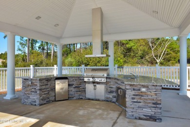 Welcome to this beautifully designed 3-bedroom, 2.5-bathroom on Brunswick Plantation and Golf Resorts in North Carolina - for sale on GolfHomes.com, golf home, golf lot