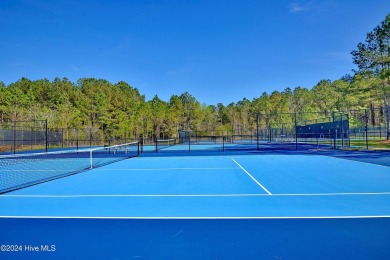 Welcome to this beautifully designed 3-bedroom, 2.5-bathroom on Brunswick Plantation and Golf Resorts in North Carolina - for sale on GolfHomes.com, golf home, golf lot