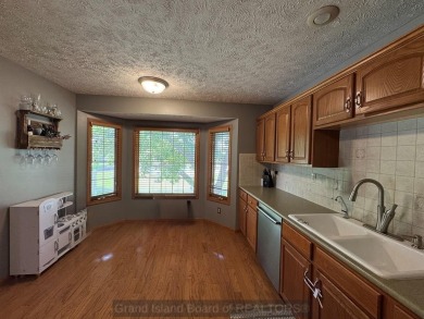 This beautiful home is located right by Indianhead Golf Course! on Indianhead Golf Club in Nebraska - for sale on GolfHomes.com, golf home, golf lot