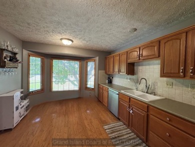 This beautiful home is located right by Indianhead Golf Course! on Indianhead Golf Club in Nebraska - for sale on GolfHomes.com, golf home, golf lot
