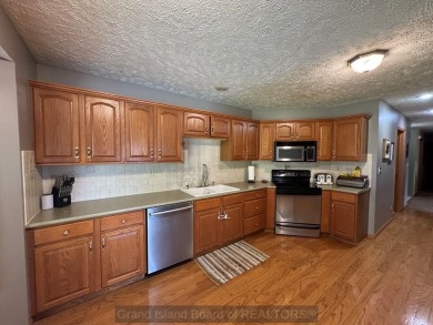 This beautiful home is located right by Indianhead Golf Course! on Indianhead Golf Club in Nebraska - for sale on GolfHomes.com, golf home, golf lot